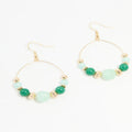 Goudkleurige ringoorbellen met groene  en gouden details- Earrings by Tina