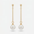 Elegante Lange Oorbellen met Parelhanger. Earrings by Tina